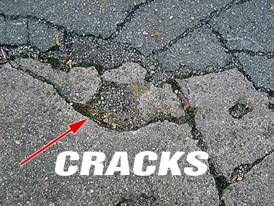 crack between the foundation and the asphalt driveways