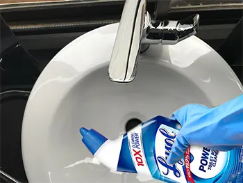 Clean sink using toilet bowl cleaner